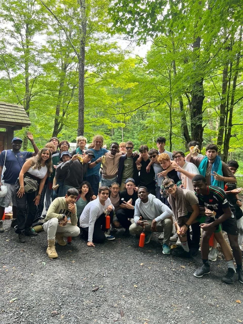 Campers together on a forest path